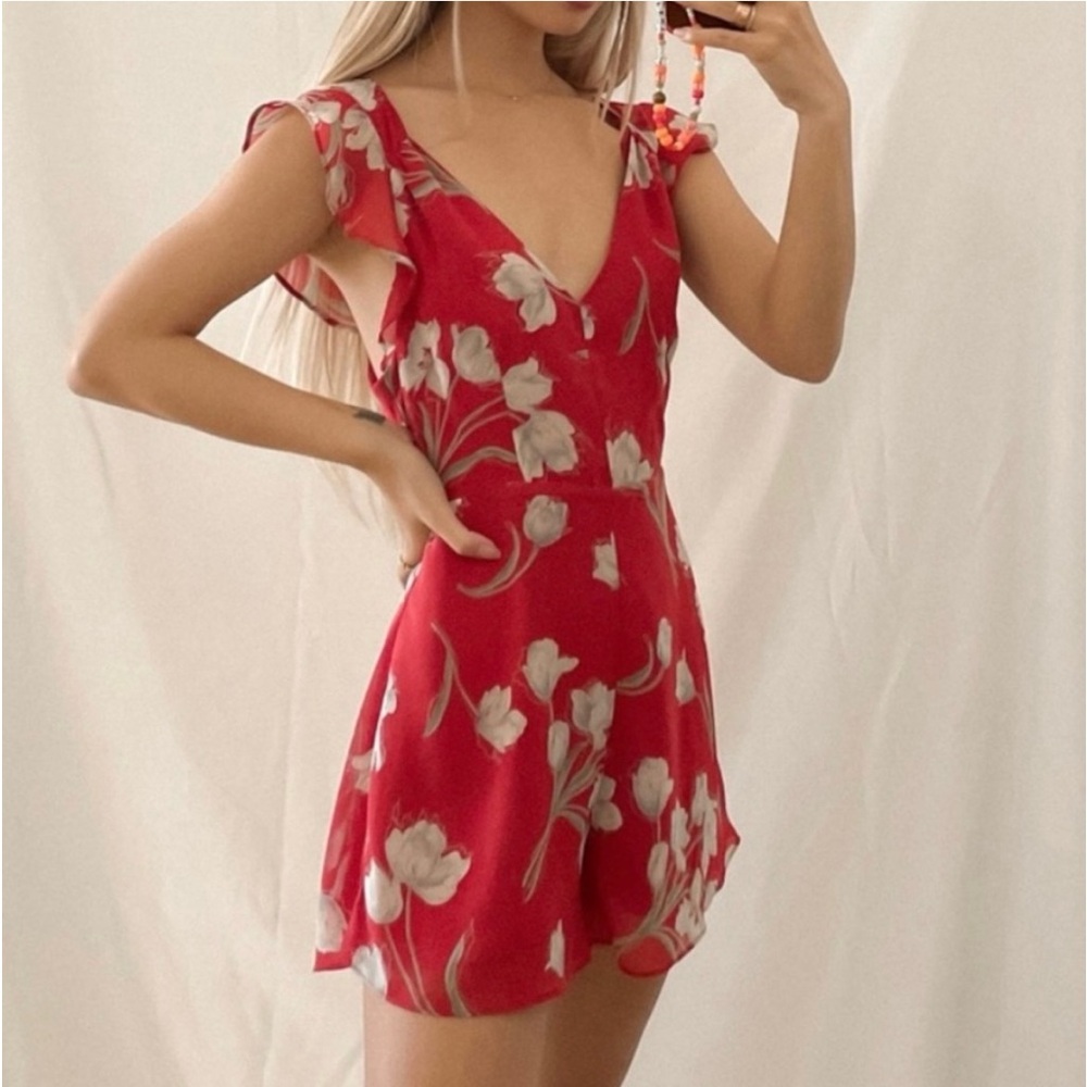 Revolve Lumiere Red Floral  Romper Size Medium. NWOT
